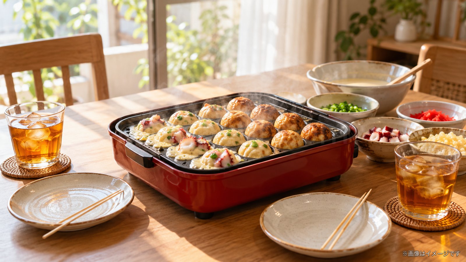 休日の食卓でたこ焼きを焼くイメージ